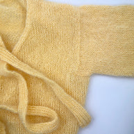 8931125 Omlottkofta i bella - beskrivning